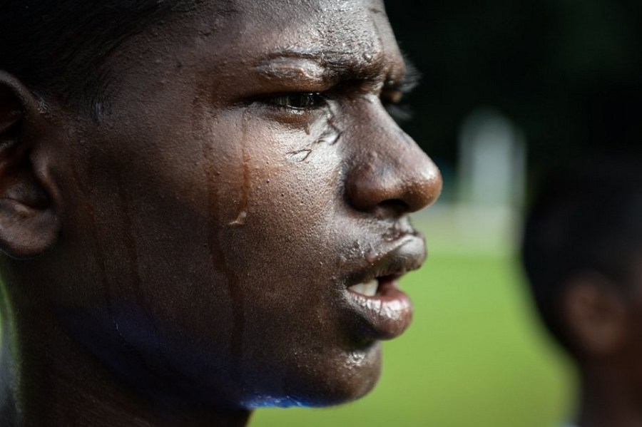 An Indian player sings the national anthem before the match against Pakistan during the second edition of the Street Child World Cup in Rio de Janeiro, Brazil, on Tuesday. About 230 boys and girls from 19 countries participate in the 10-day-long tournament. Yasuyoshi Chiba / AFP / April 1, 2014